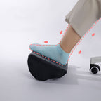 Ergonomic Under-Desk Footrest used on a desk setup, alternate view
