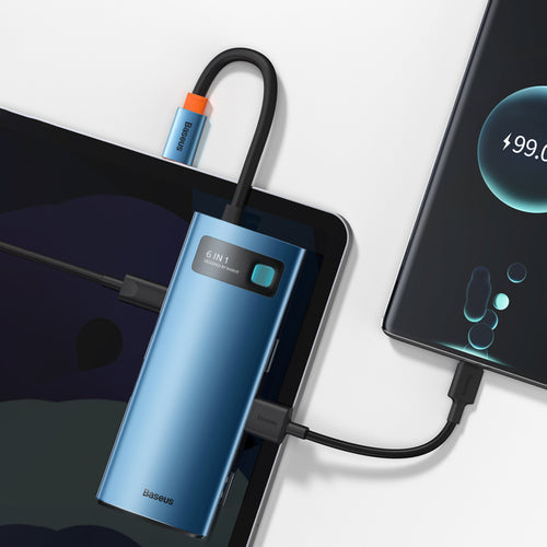 6-in-1 USB-C multiport hub in blue aluminium connected to a laptop and phone
